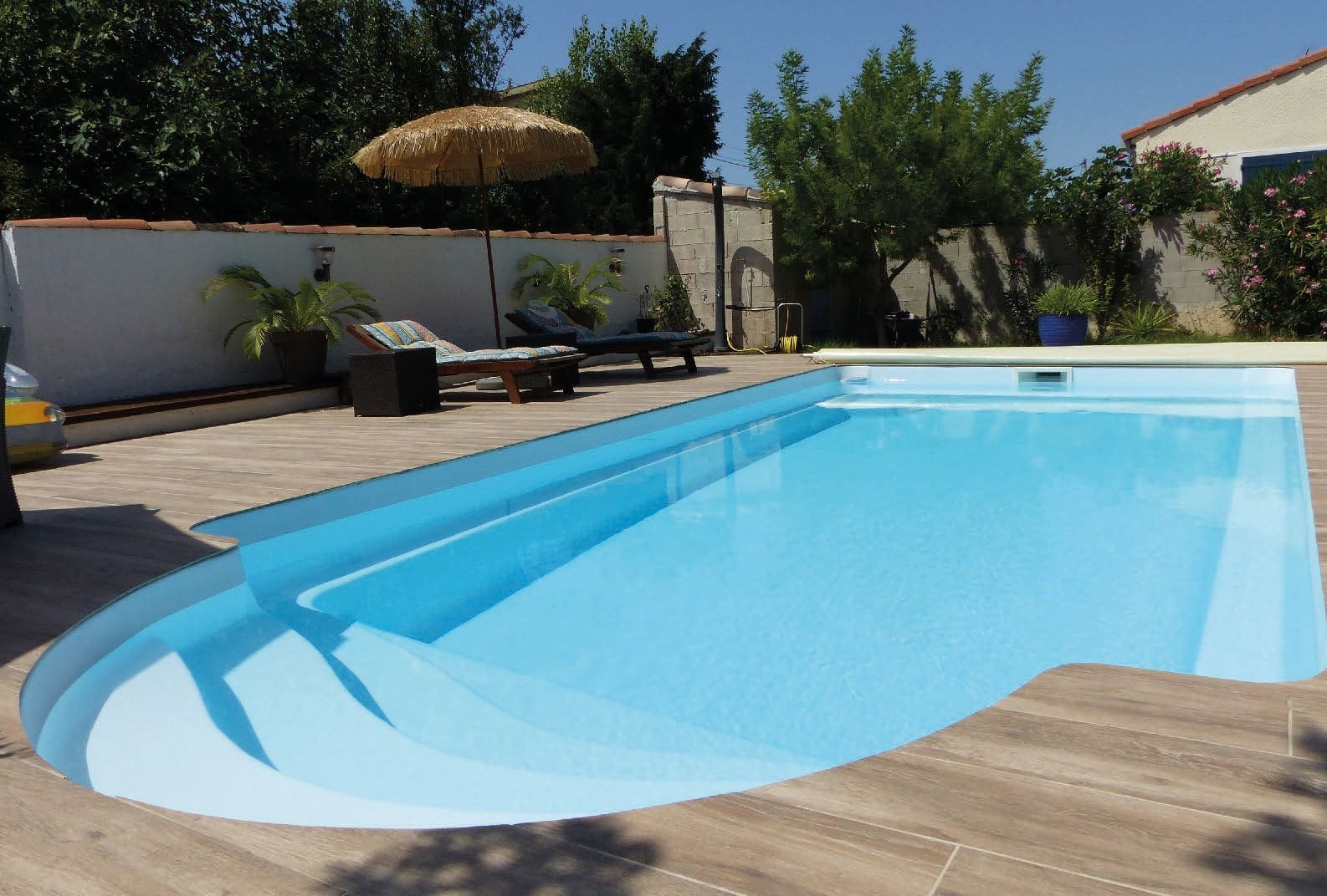 Roma fibreglass swimming pool with Roman-style entrance steps